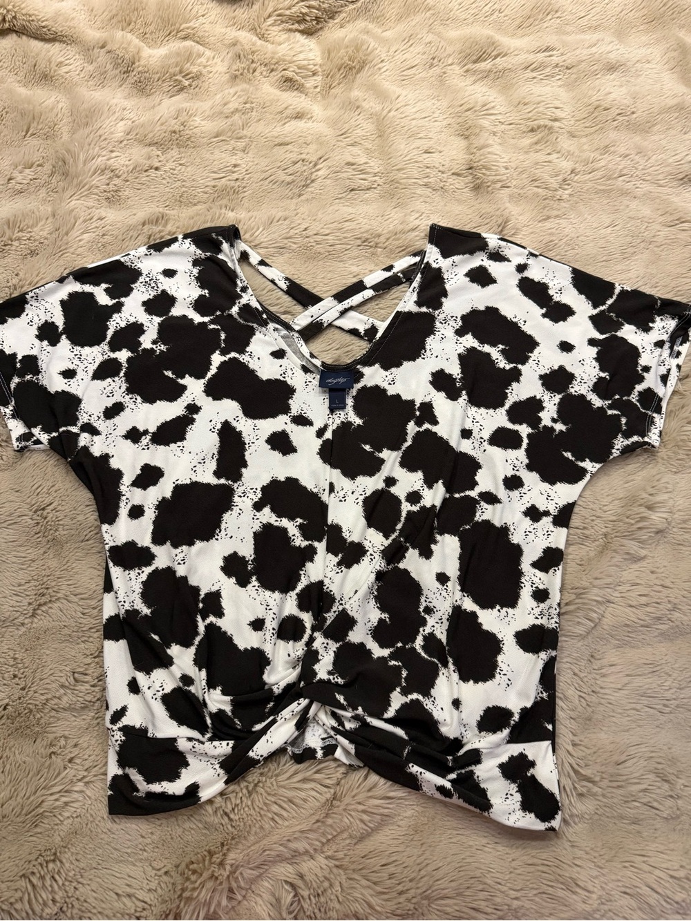 Daytrip Black and White Cow Print Twist Front Top